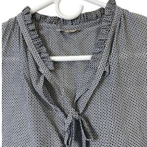 Jigsaw women's sleeveless v-neck with ruffle detail & tie.